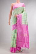 Pure Silk Pure Zari Pista Green Kanjivaram Saree with Checked design on the body and Plain Border.  displayed on a mannequin