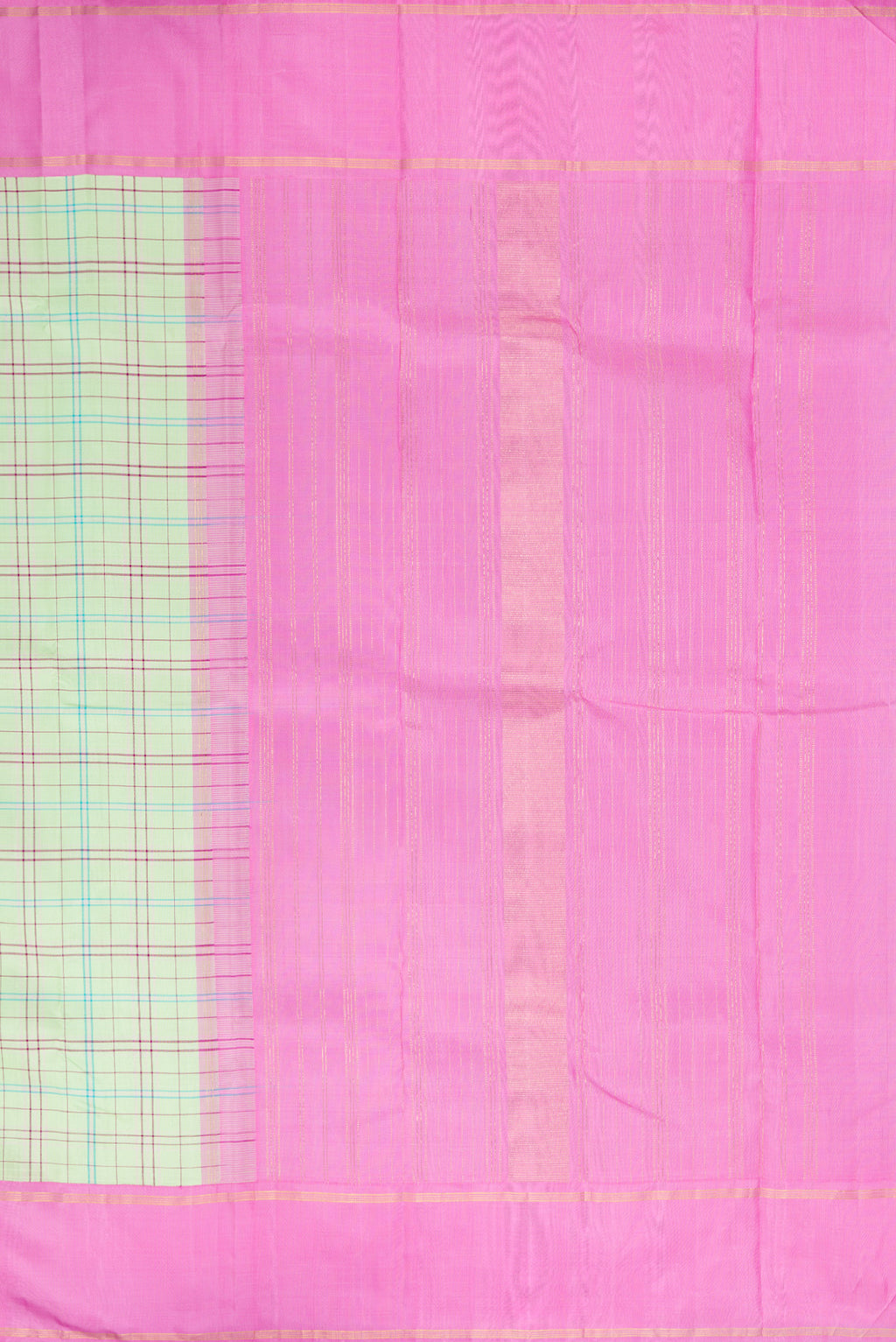 Close up image of the pallu of Pure Silk Pure Zari Pista Green Kanjivaram Saree with Checked design on the body and Plain Border. 