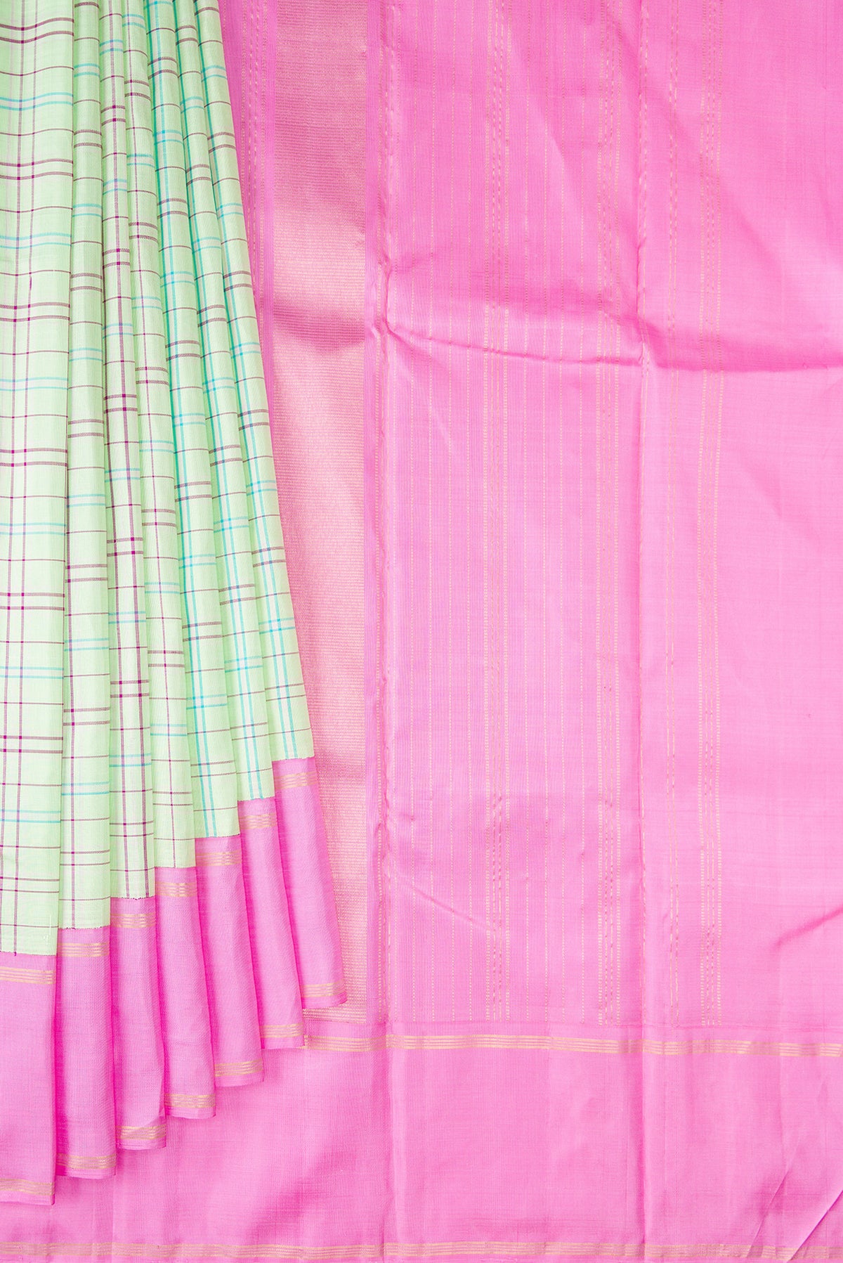 Pleats and pallu of Pure Silk Pure Zari Pista Green Kanjivaram Saree with Checked design on the body and Plain Border. 