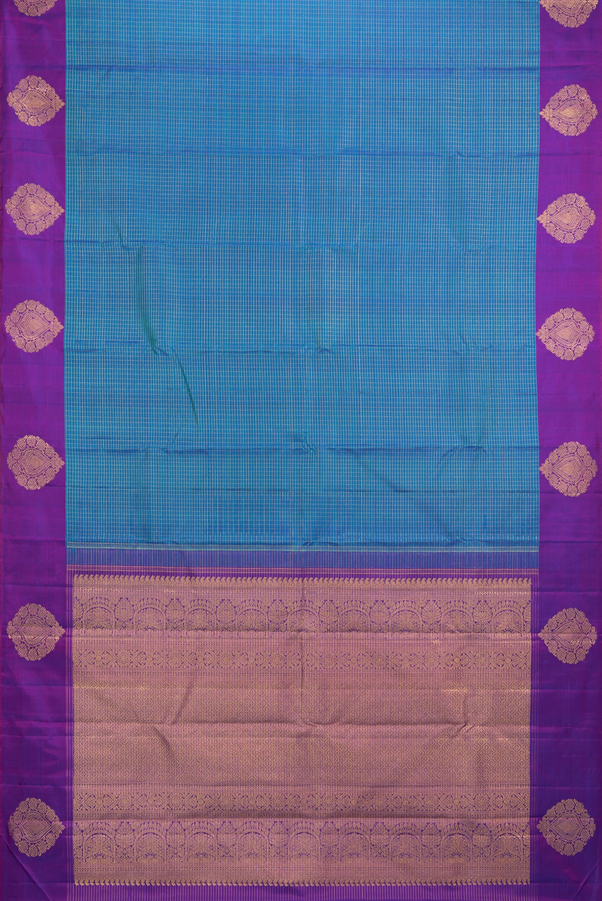 Flat view of Pure Silk Peacock Blue Kanjivaram Saree with Checked design on the body and Fancy Border. 