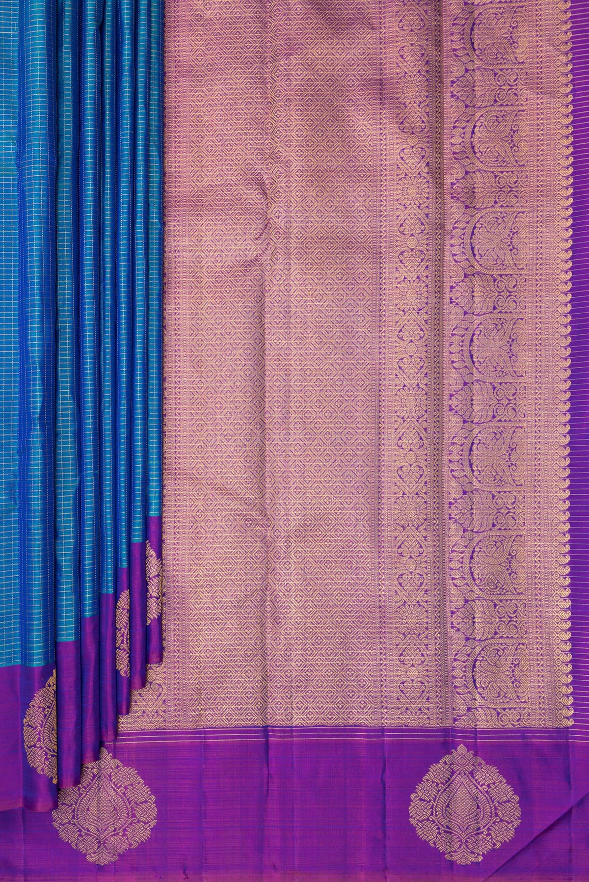 Pleats and pallu of Pure Silk Peacock Blue Kanjivaram Saree with Checked design on the body and Fancy Border. 