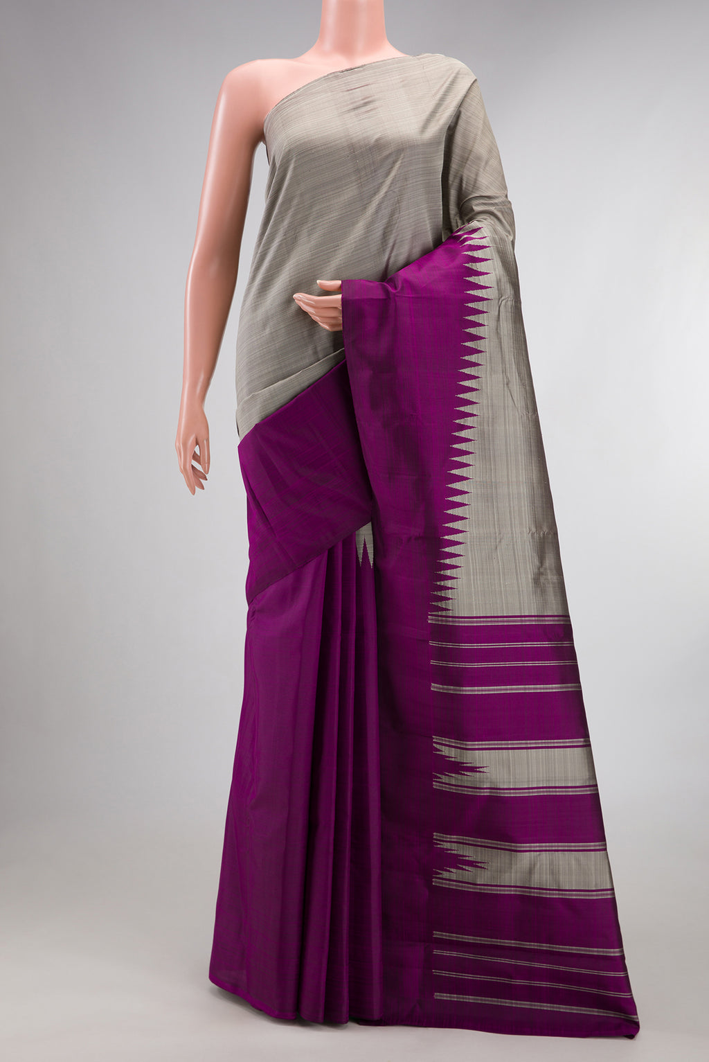 Pure Silk Grey and Purple Color Kanchipuram Saree with Half And Half on the body and Rising Temple Border.  displayed on a mannequin