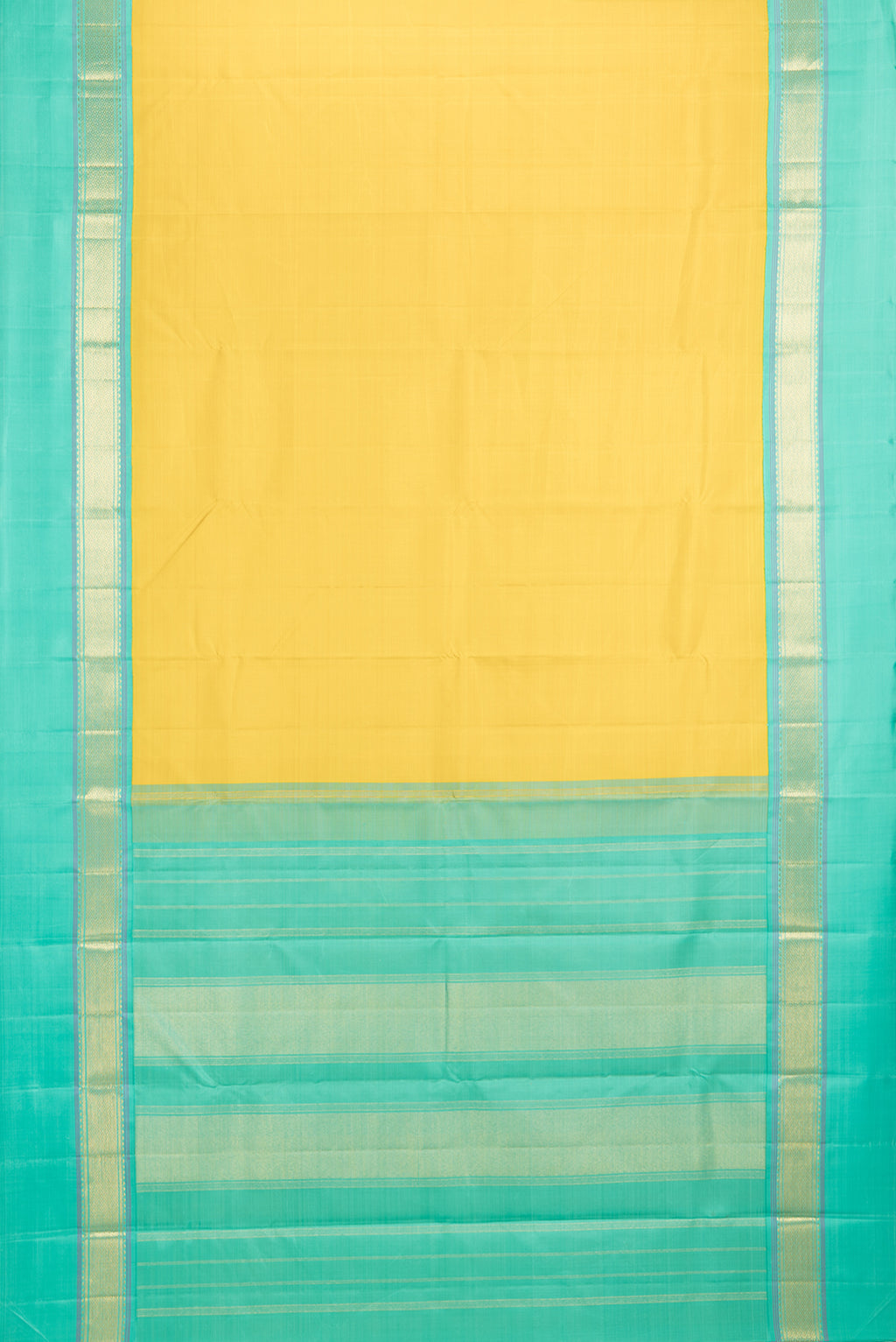 Flat view of Pure Silk Yellow Kanjivaram Saree with Plain Body and Zari Border. 