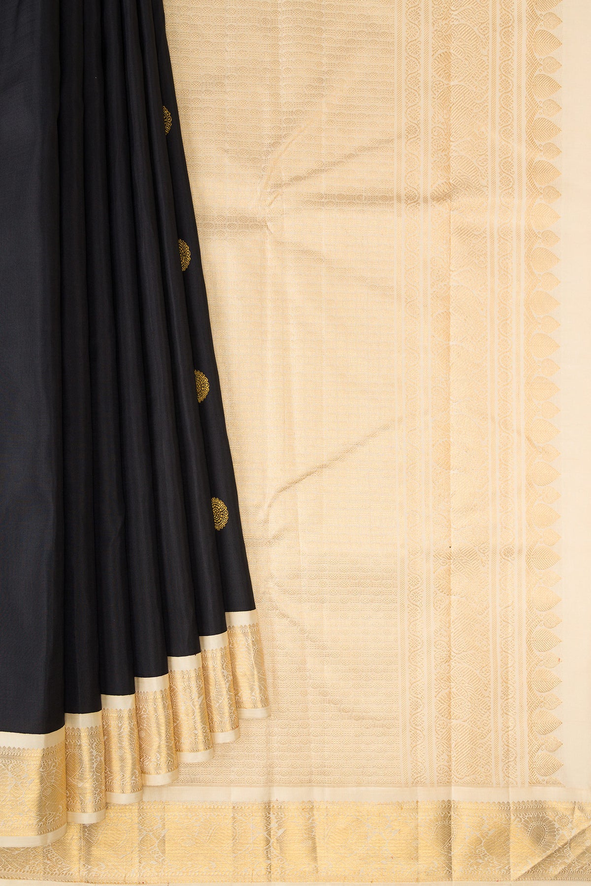 Pleats and pallu of Pure Silk Black Kanjivaram Saree with Zari Butta on the body and Zari Border. 