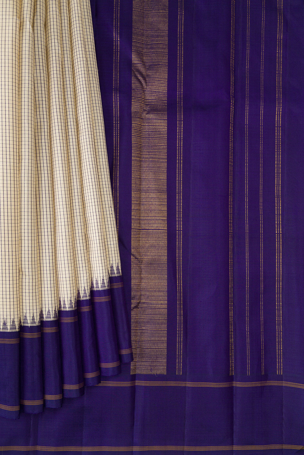 Pleats and pallu of Pure Silk Pure Zari Beige Kanjivaram Saree with Checked design on the body and Temple Border. 