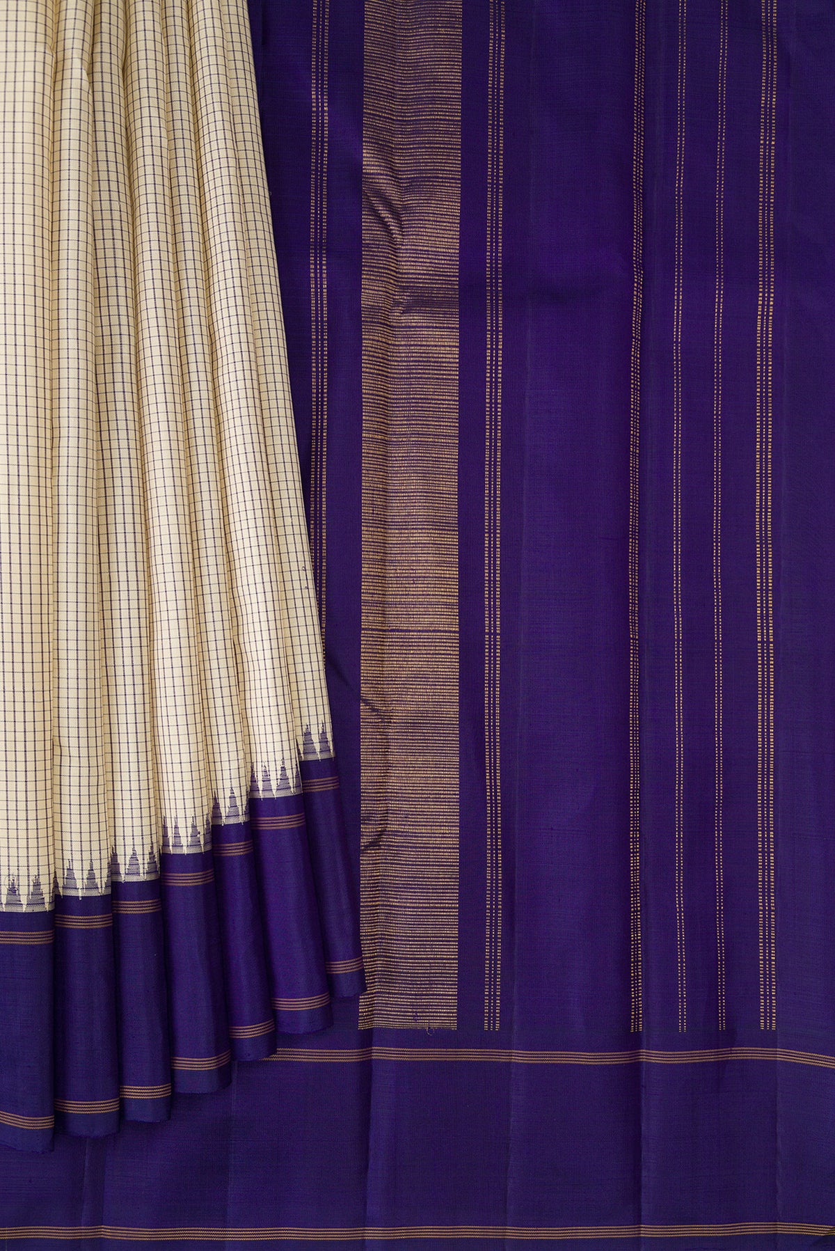 Pleats and pallu of Pure Silk Pure Zari Beige Kanjivaram Saree with Checked design on the body and Temple Border. 