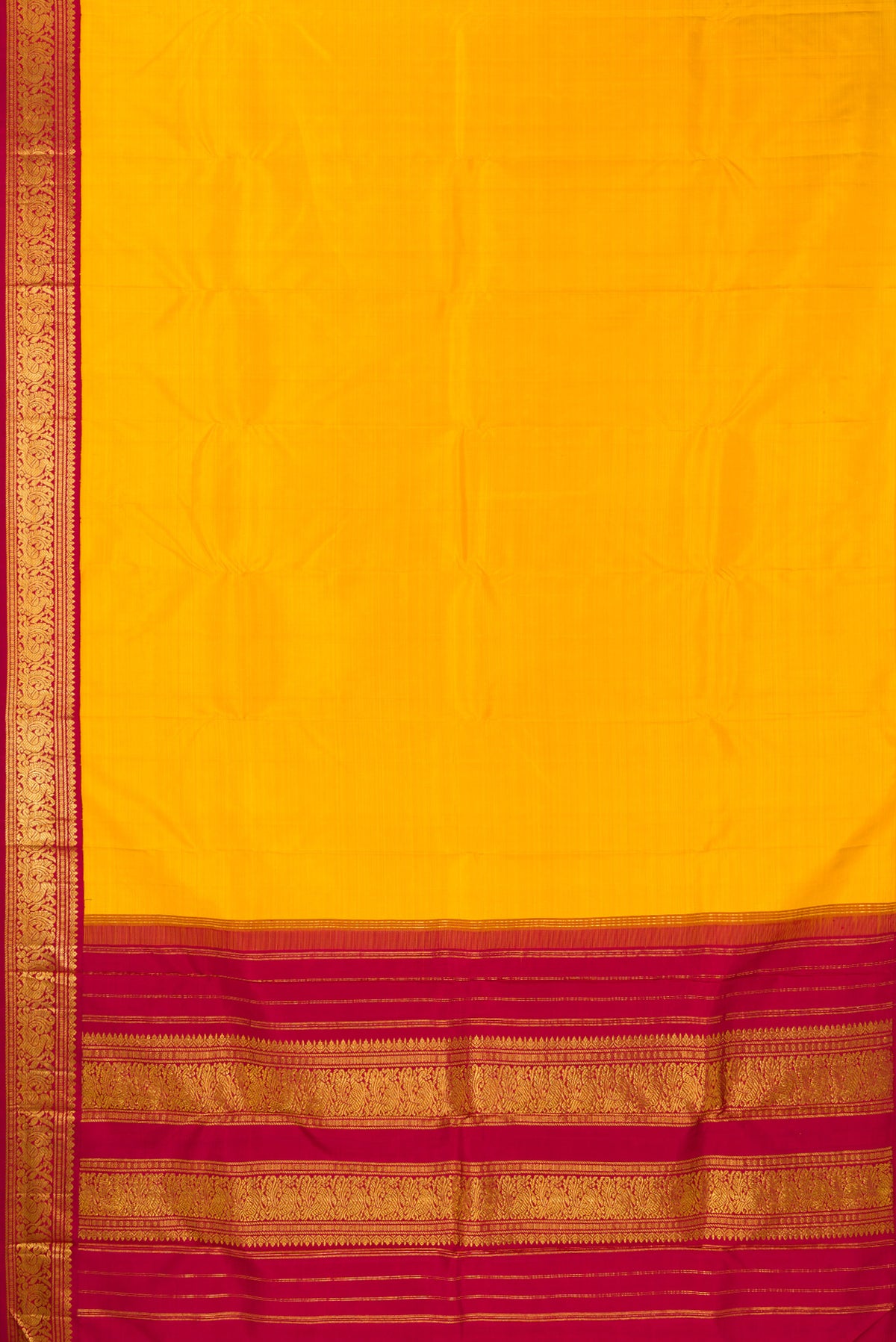 Flat view of Pure Silk Pure Zari Yellow Dual Tone Kanjivaram Saree with Plain Body and One Side Border. 