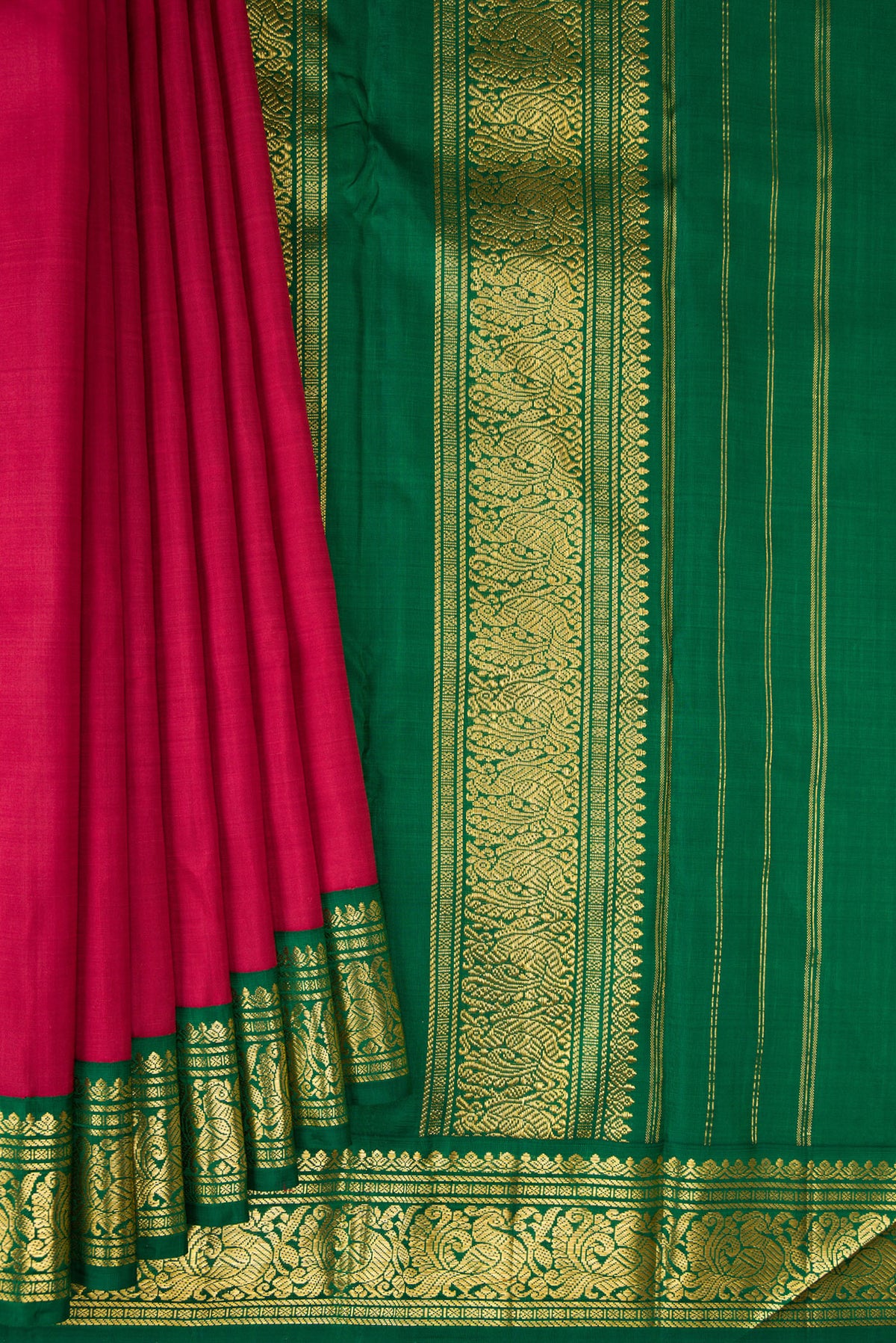Pleats and pallu of Pure Silk Pure Zari Deep Red Kanjivaram Saree with Plain Body and One Side Border. 