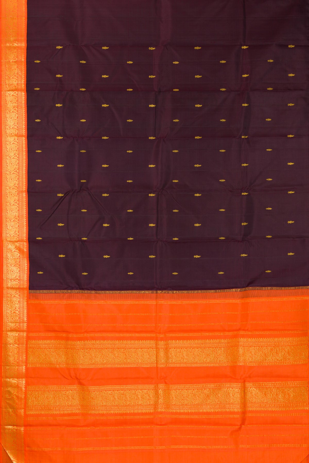 Flat view of Pure Silk Pure Zari Coffee Brown Kanjivaram Saree with Zari Butta on the body and One Side Border. 