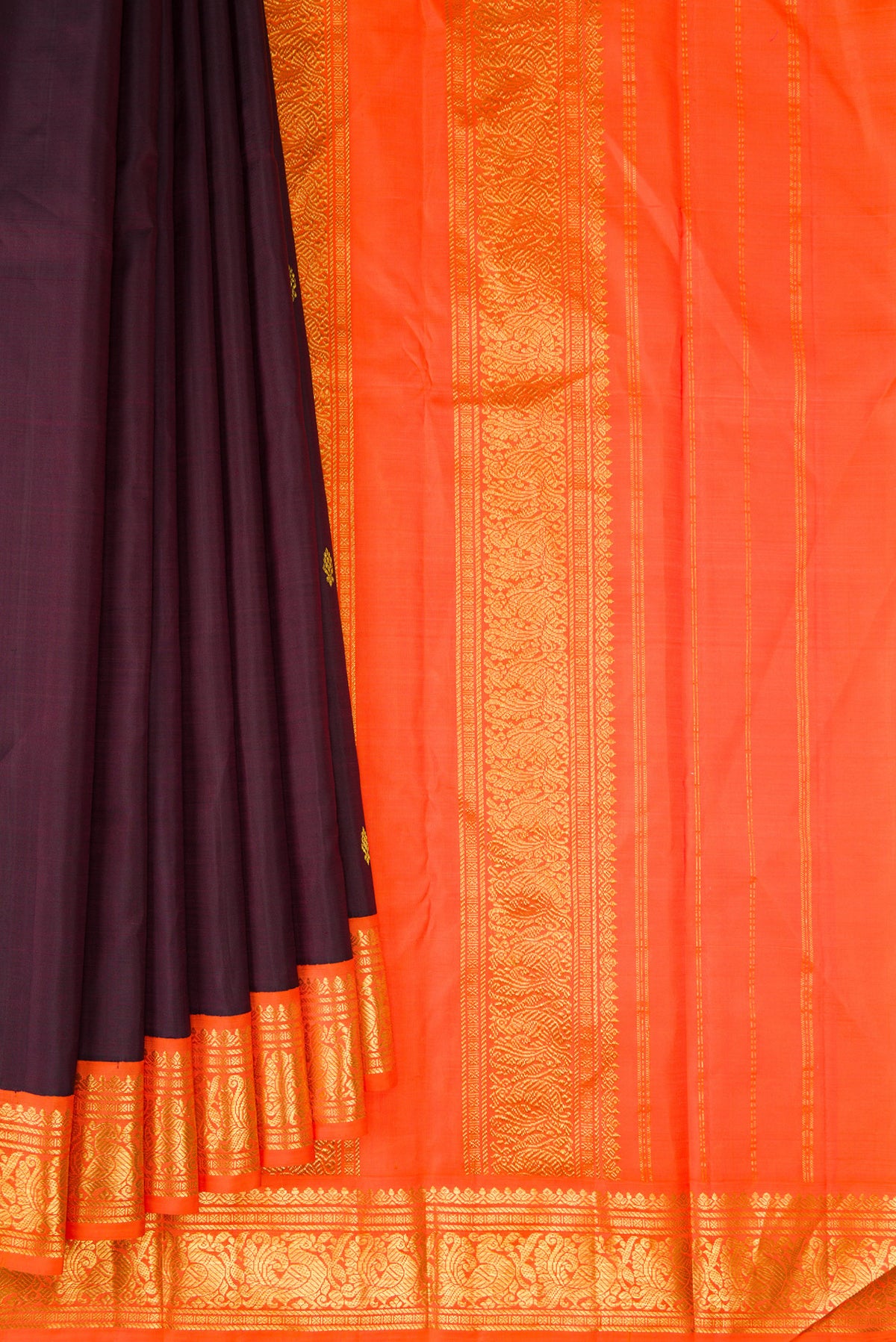 Pleats and pallu of Pure Silk Pure Zari Coffee Brown Kanjivaram Saree with Zari Butta on the body and One Side Border. 