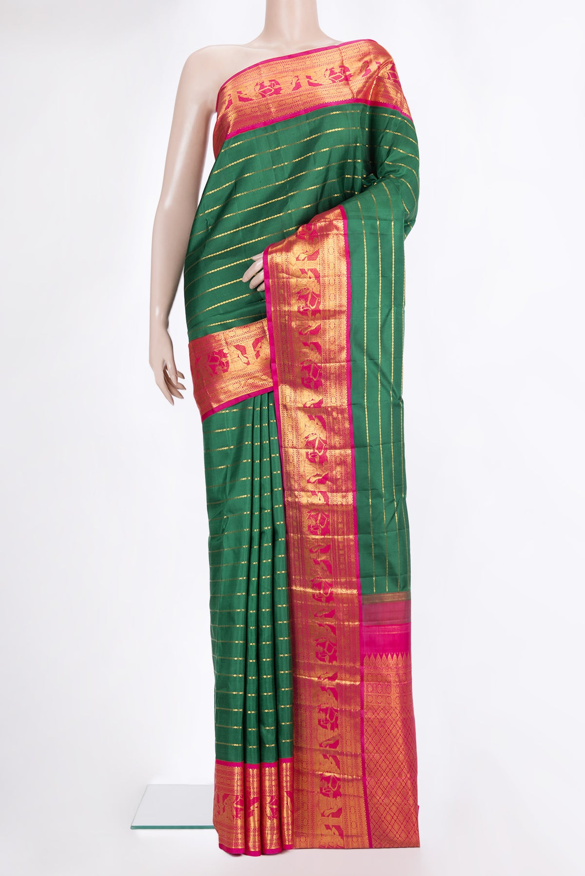 Pure Silk Bottle Green Kanchipuram Saree with Veldhari on the body and Zari Border.  displayed on a mannequin