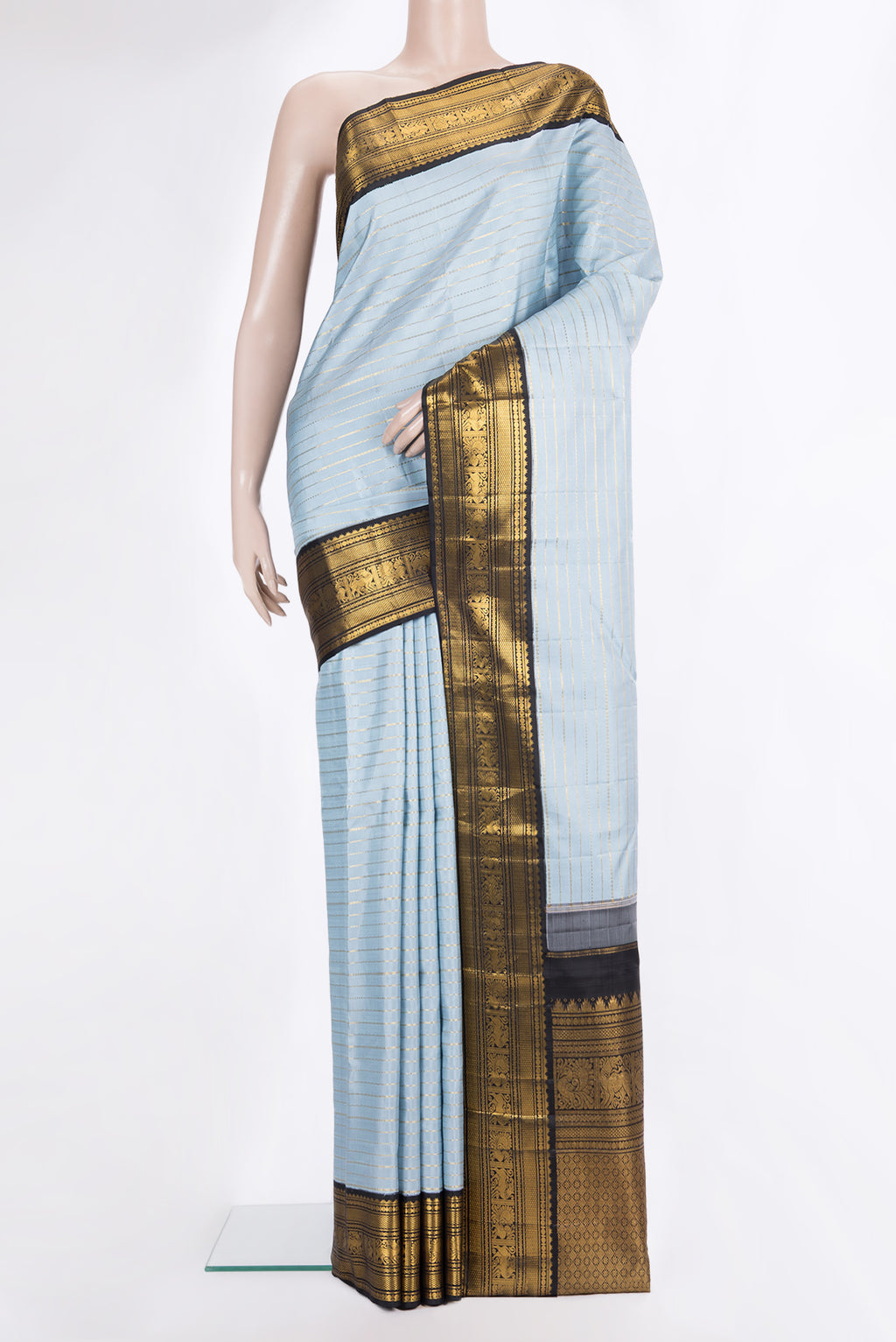 Pure Silk Light Blue Kanjivaram Saree with Veldhari on the body and Zari Border.  displayed on a mannequin