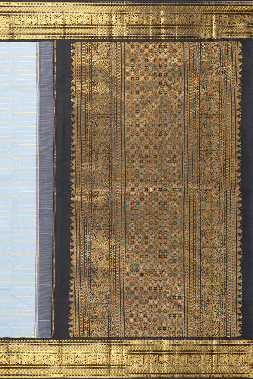 Close up image of the pallu of Pure Silk Light Blue Kanjivaram Saree with Veldhari on the body and Zari Border. 