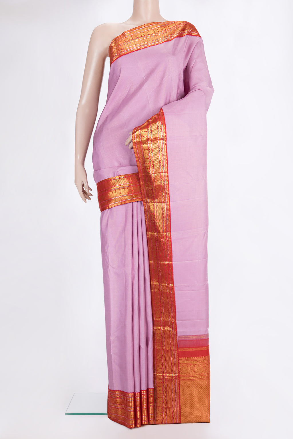 Pure Silk Pink Kanjivaram Saree with Stripes on the body and Zari Border.  displayed on a mannequin