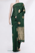 Pure Silk Bottle Green Banarasi Tussar Saree with Zari Butta on the body and Without Border.  displayed on a mannequin