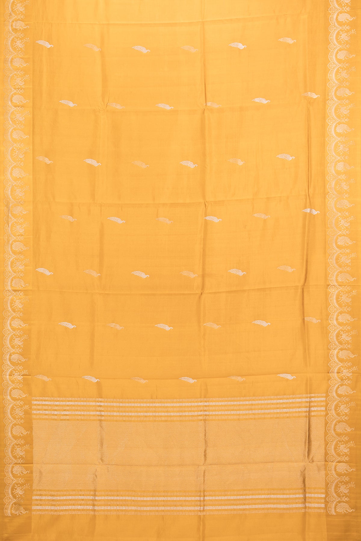 Flat view of Pure Silk Mustard Banarasi Katan Saree with Zari Butta on the body and Fancy Border. 