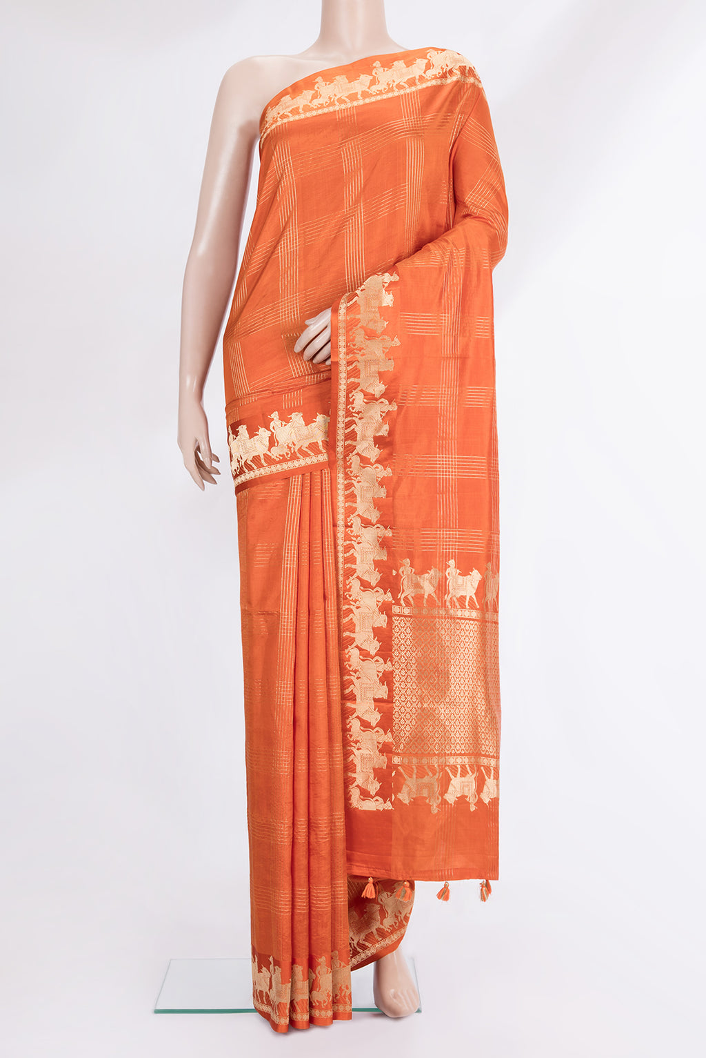 Orange Tussar Saree with Checked design on the body and Fancy Border.  displayed on a mannequin