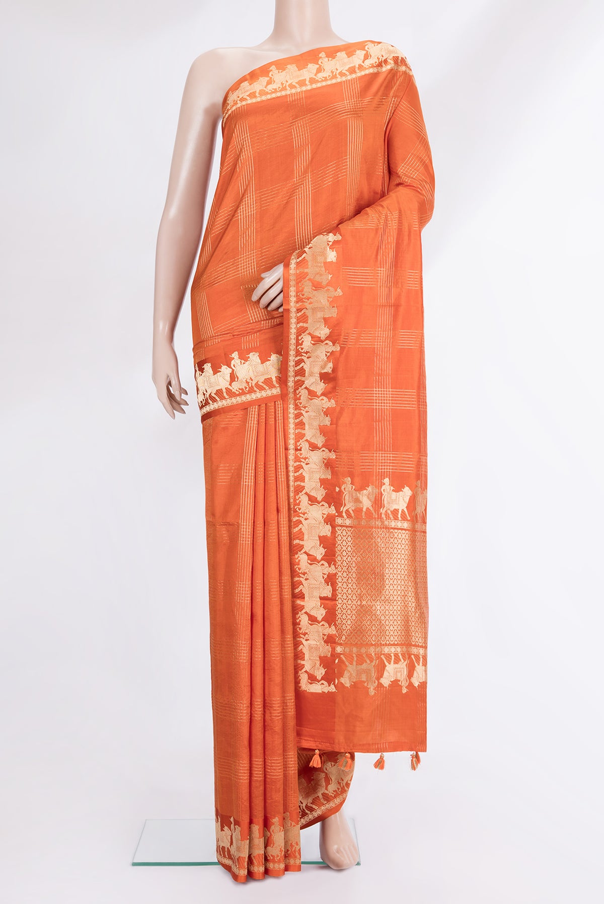 Orange Tussar Saree with Checked design on the body and Fancy Border.  displayed on a mannequin
