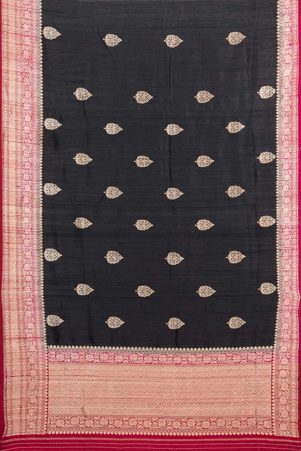 Flat view of Pure Silk Black Banarasi Tussar Saree with Zari Butta on the body and Zari Border. 