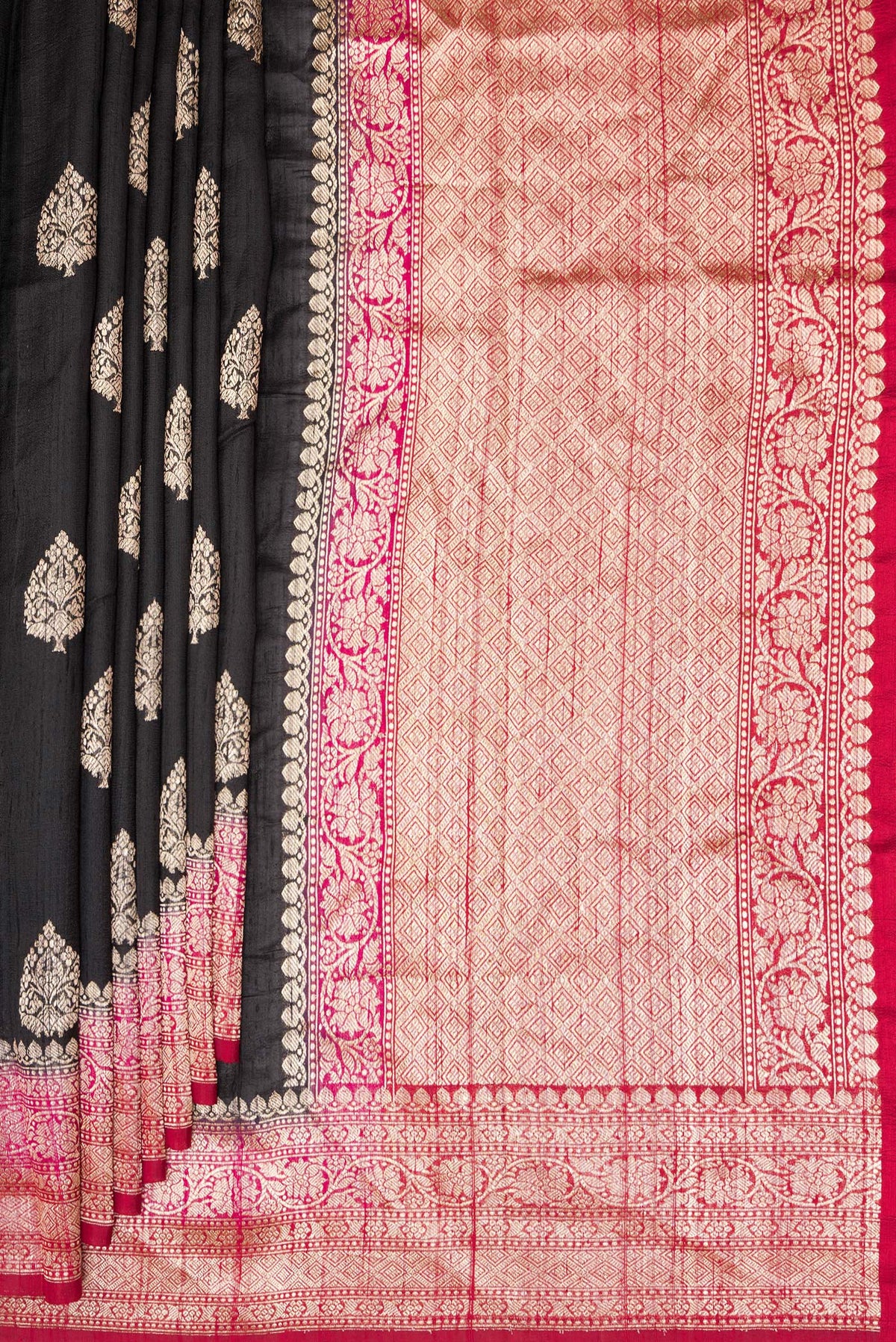 Pleats and pallu of Pure Silk Black Banarasi Tussar Saree with Zari Butta on the body and Zari Border. 