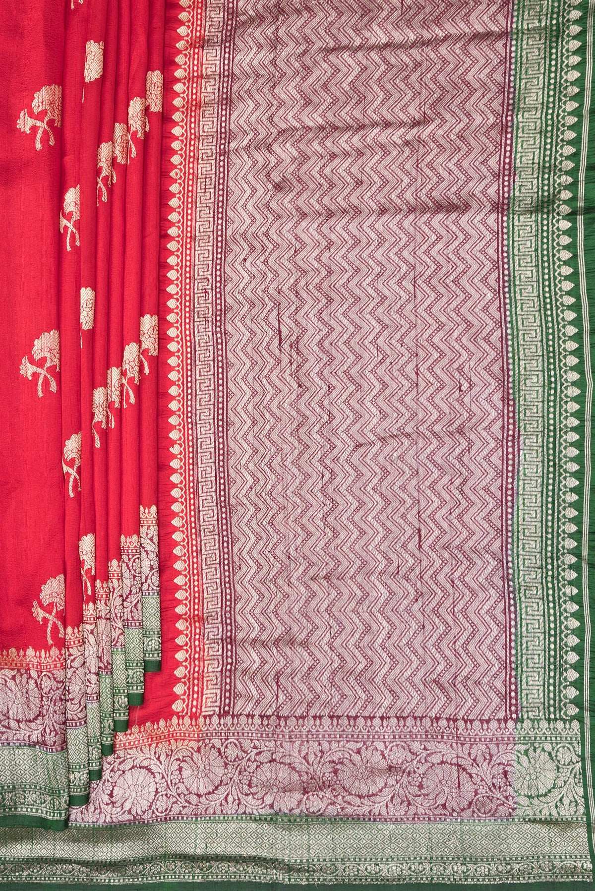 Pleats and pallu of Pure Silk Red Banarasi Tussar Saree with Zari Butta on the body and Zari Border. 