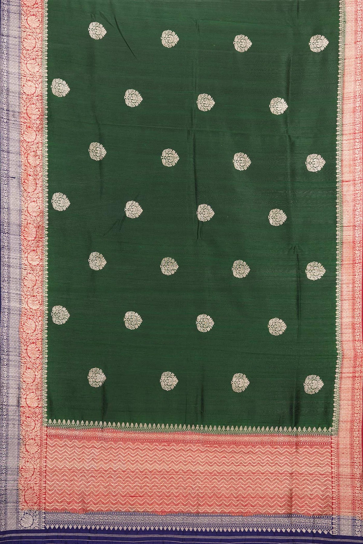 Flat view of Pure Silk Bottle Green Banarasi Tussar Saree with Zari Butta on the body and Zari Border. 