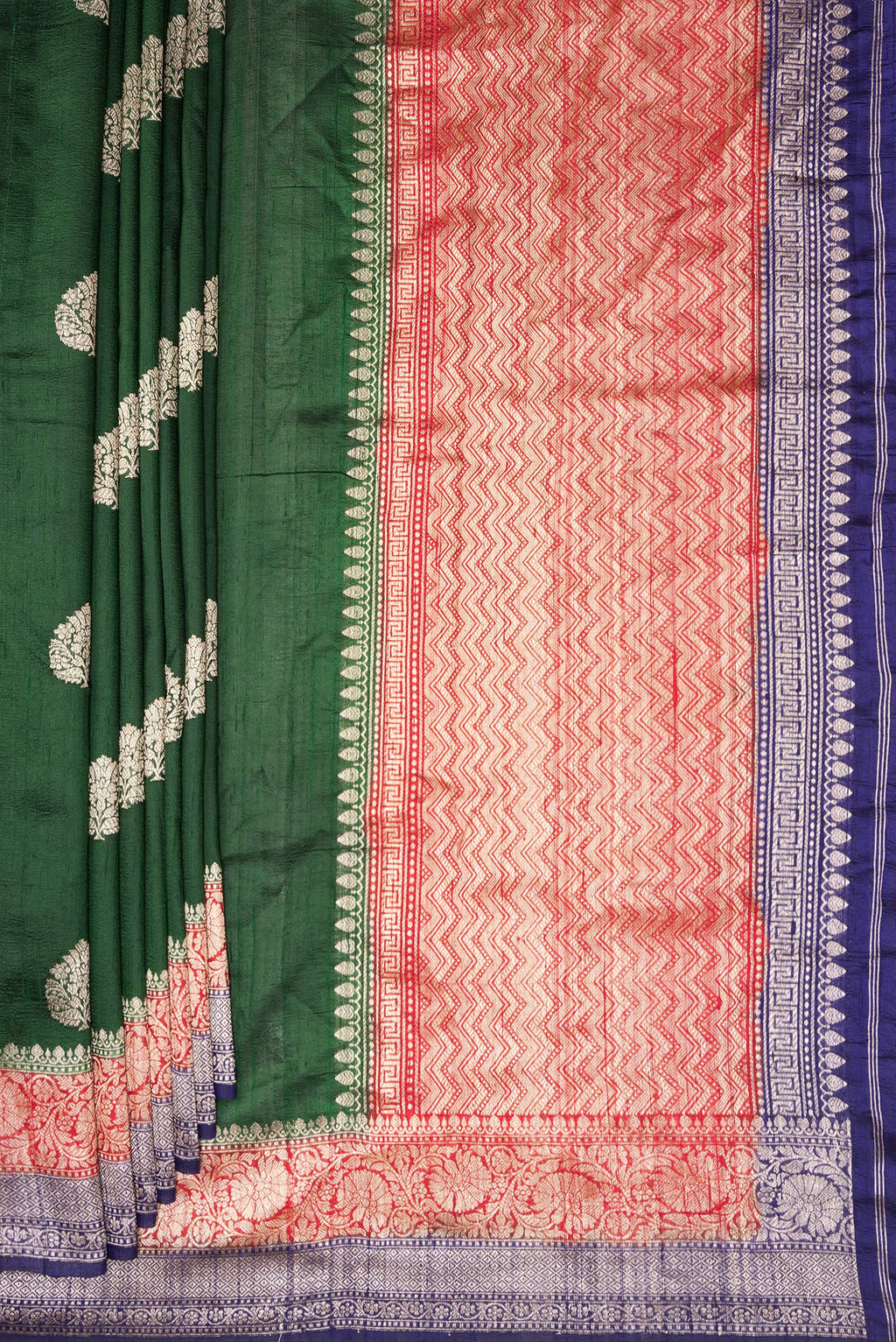 Pleats and pallu of Pure Silk Bottle Green Banarasi Tussar Saree with Zari Butta on the body and Zari Border. 