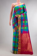 Pure Silk Multi Color Kanjivaram Saree with Checked design on the body and Zari Border.  displayed on a mannequin