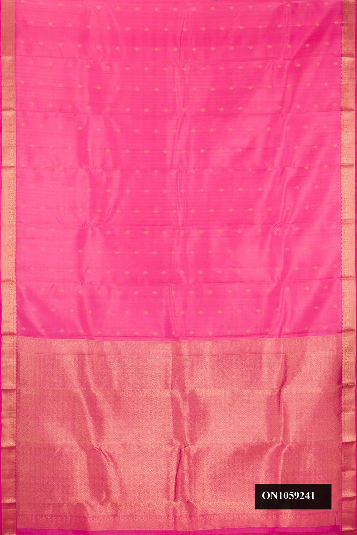 Pink Dual Tone Kanchipuram Silk Saree with Zari Butta on the body and Zari Border.  displayed on a mannequin