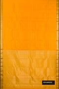 Mustard Dual Tone Kanchipuram Silk Saree with Zari Butta on the body and Zari Border.  displayed on a mannequin