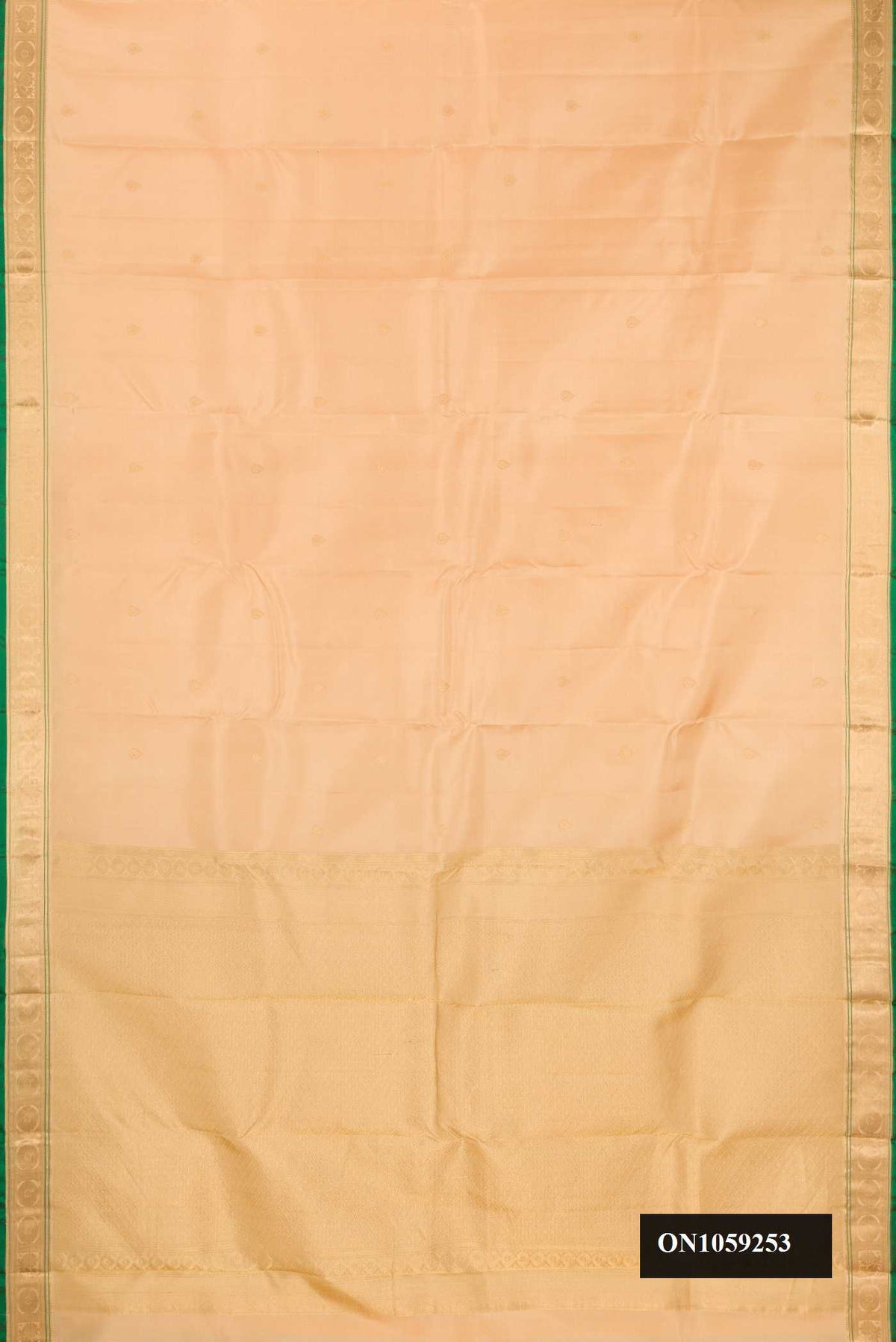 Sandal Dual Tone Kanchipuram Silk Saree with Zari Butta on the body and Zari Border.  displayed on a mannequin