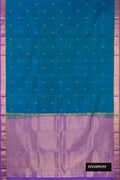 Peacock Blue Dual Tone Kanchipuram Silk Saree with Zari Butta on the body and Zari Border.  displayed on a mannequin