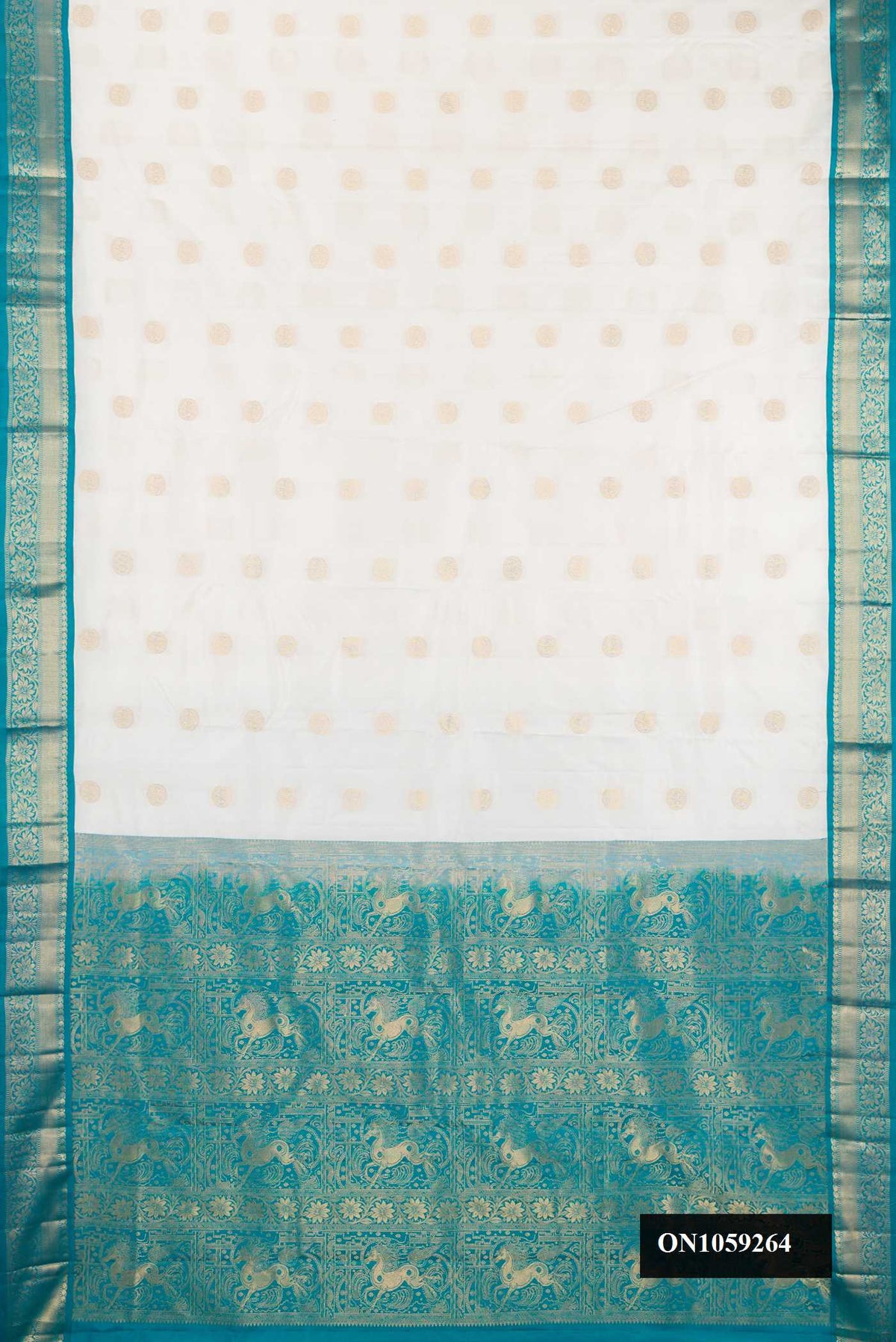 White Dual Tone Kanchipuram Silk Saree with Zari Butta on the body and Zari Border.  displayed on a mannequin