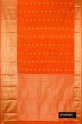 Orange Dual Tone Kanchipuram Silk Saree with Zari Butta on the body and Zari Border.  displayed on a mannequin