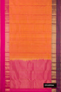 Coral Dual Tone Kanchipuram Silk Saree with Zari Butta on the body and Ganga Jamuna Border.  displayed on a mannequin