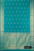 Peacock Blue Dual Tone Kanchipuram Silk Saree with Zari Butta on the body and Fancy Border.  displayed on a mannequin