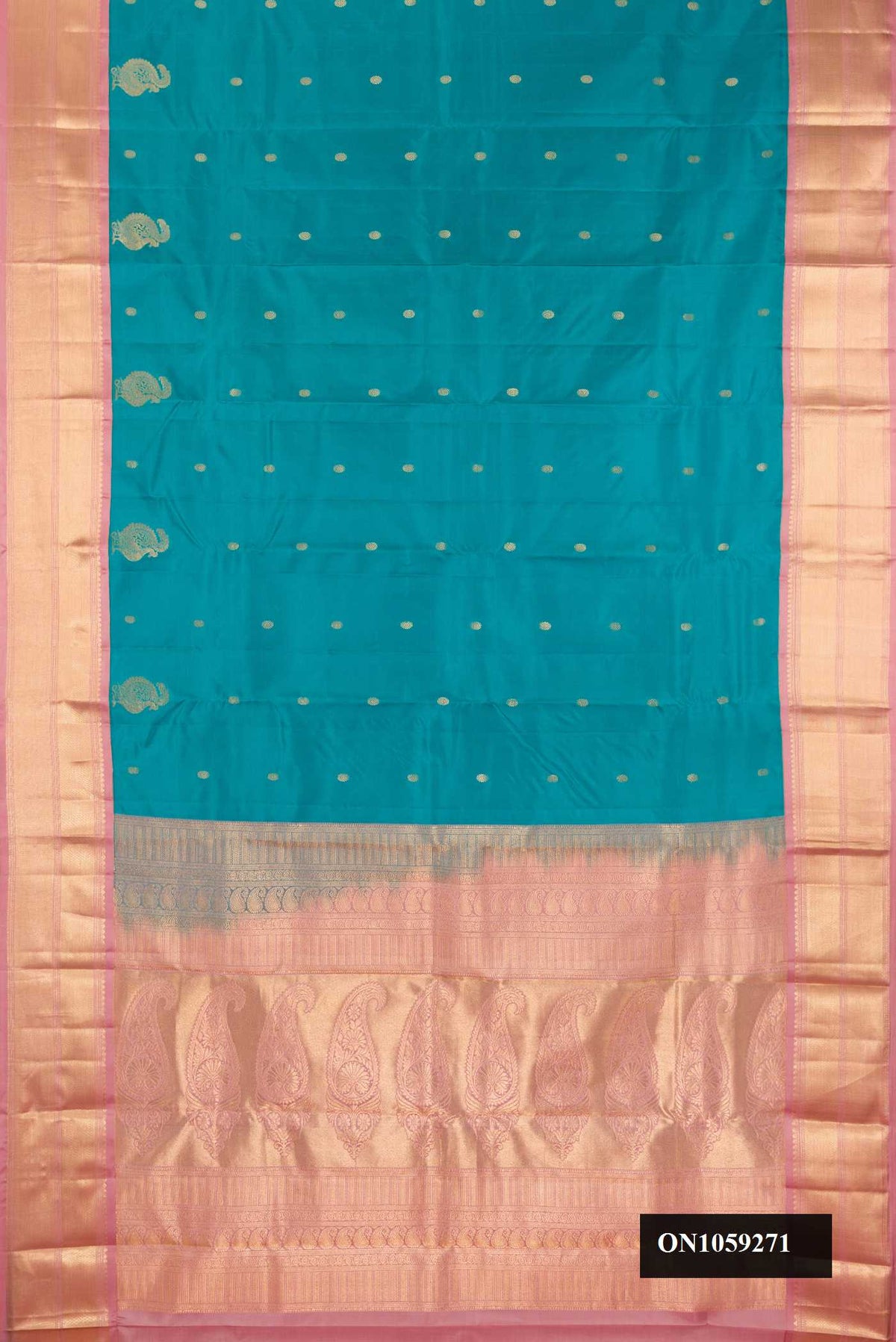 Blue Dual Tone Kanchipuram Silk Saree with Zari Butta on the body and Fancy Border.  displayed on a mannequin