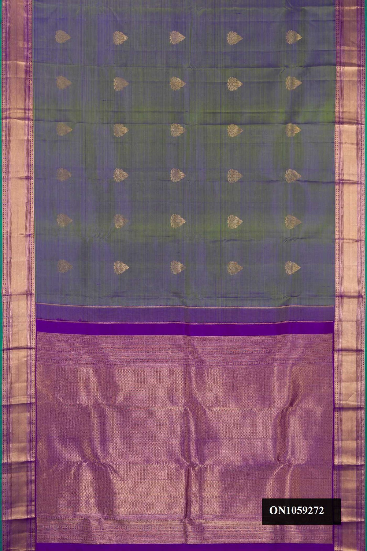 Mehandi Green Dual Tone Kanchipuram Silk Saree with Zari Butta on the body and Zari Border.  displayed on a mannequin