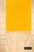 Yellow Dual Tone Kanchipuram Silk Saree with Zari Butta on the body and Zari Border.  displayed on a mannequin