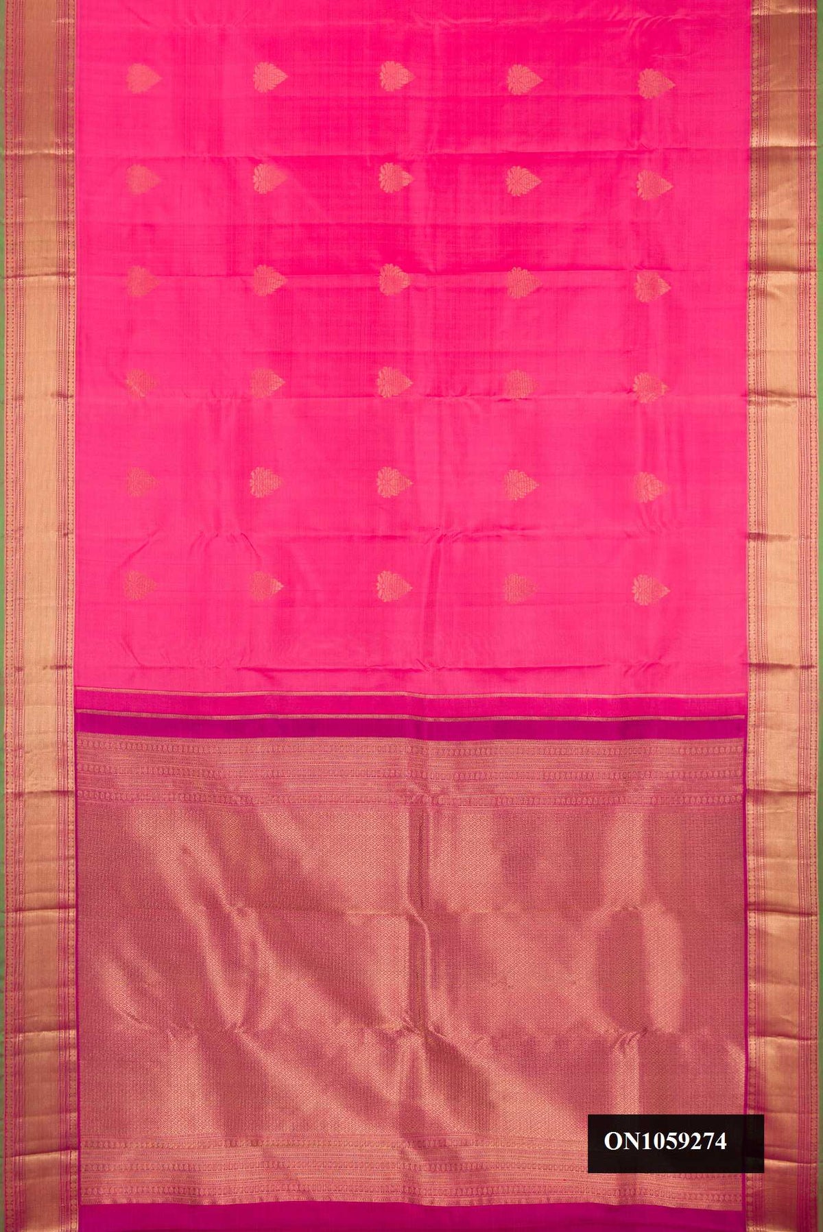Pink Dual Tone Kanchipuram Silk Saree with Zari Butta on the body and Zari Border.  displayed on a mannequin