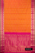 Mustard Dual Tone Kanchipuram Silk Saree with Zari Butta on the body and Fancy Border.  displayed on a mannequin