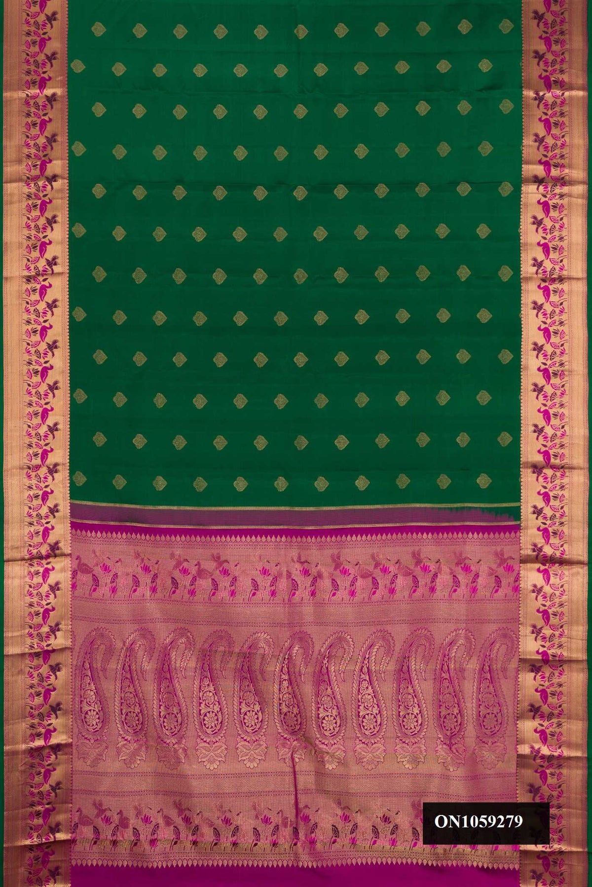 Bottle Green Dual Tone Kanchipuram Silk Saree with Zari Butta on the body and Fancy Border.  displayed on a mannequin