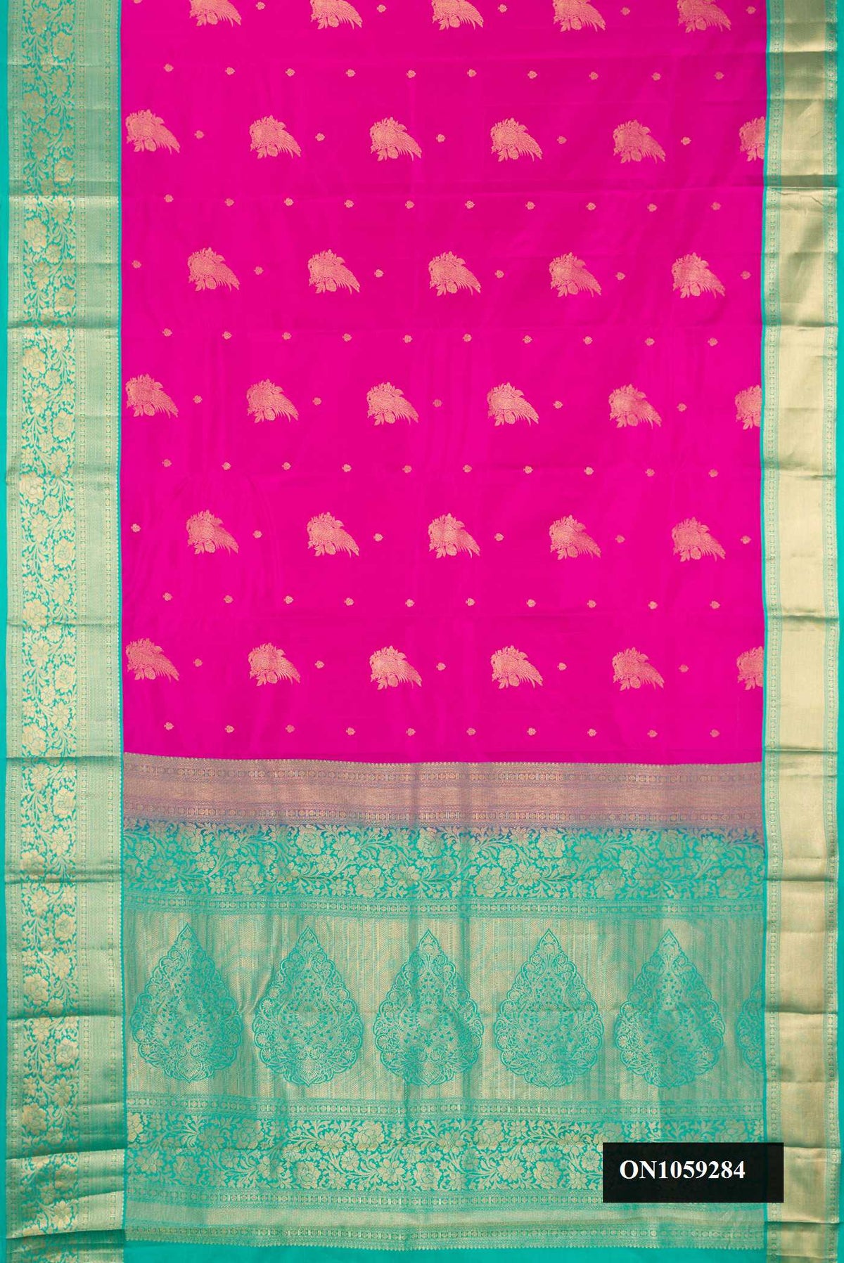 Rani Pink Dual Tone Kanchipuram Silk Saree with Zari Butta on the body and Zari Border.  displayed on a mannequin
