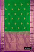 Green Dual Tone Kanchipuram Silk Saree with Zari Butta on the body and Zari Border.  displayed on a mannequin