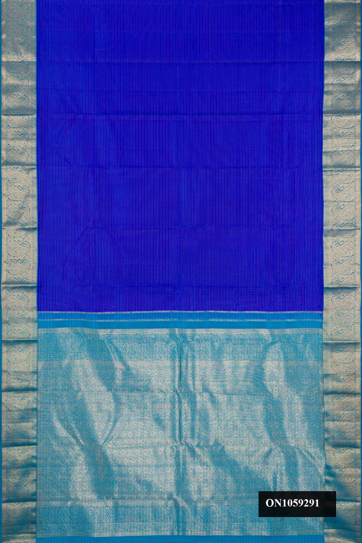 Royal Blue Dual Tone Kanchipuram Silk Saree with Stripes on the body and Zari Border.  displayed on a mannequin