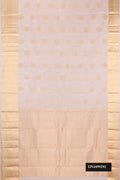 Rose Gold Dual Tone Kanchipuram Silk Saree with Stripes on the body and Zari Border.  displayed on a mannequin
