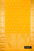 Yellow Dual Tone Kanchipuram Silk Saree with Stripes on the body and Zari Border.  displayed on a mannequin