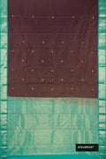 Brown Dual Tone Kanchipuram Silk Saree with Stripes on the body and Zari Border.  displayed on a mannequin
