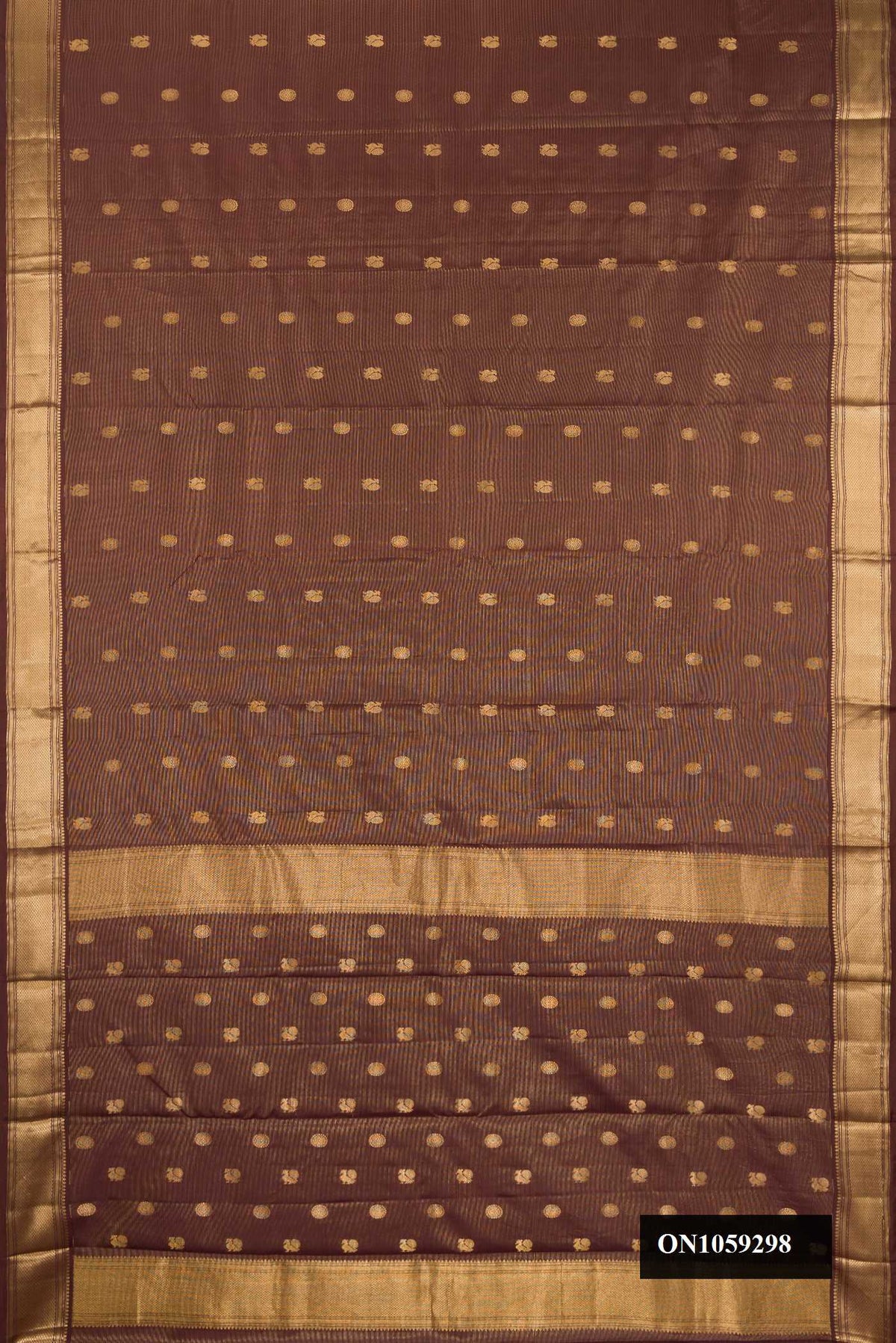 Brown Dual Tone Kanchipuram Silk Saree with Stripes on the body and Zari Border.  displayed on a mannequin