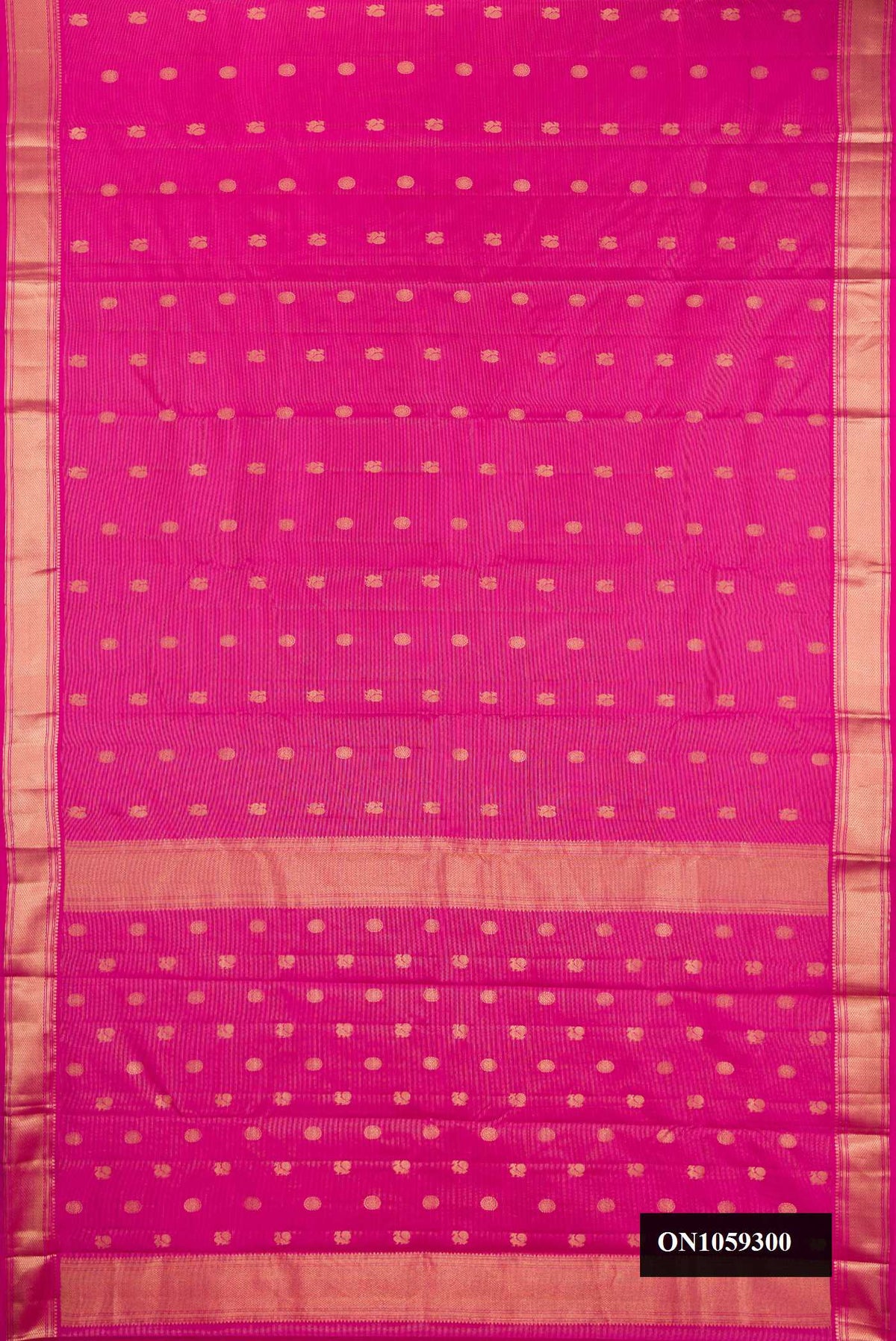 Dark Pink Dual Tone Kanchipuram Silk Saree with Stripes on the body and Zari Border.  displayed on a mannequin